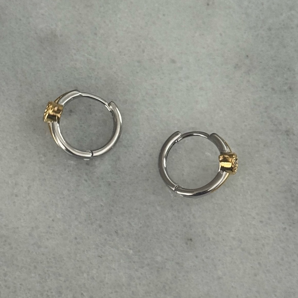 Silver Gold Two Tone Star Burst Crystal Hoop Earrings
14mm
Sterling Silver - Picture 3 of 4